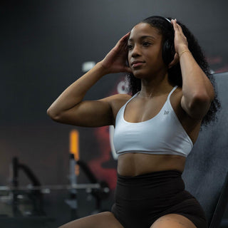 Stay Motivated and Informed: 5 Fitness Podcasts to Listen to While Working Out-Muscle Nation