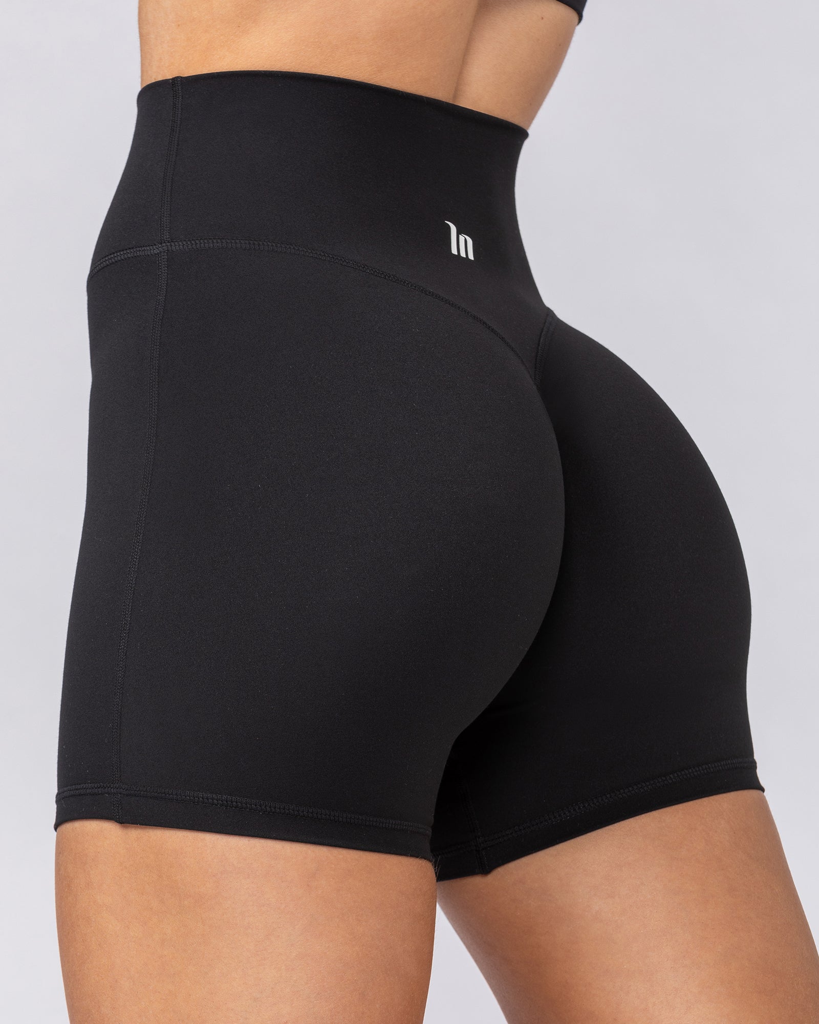 Aura Peachy Invisible Scrunch Midway Shorts Black - Muscle Nation women's gym shorts